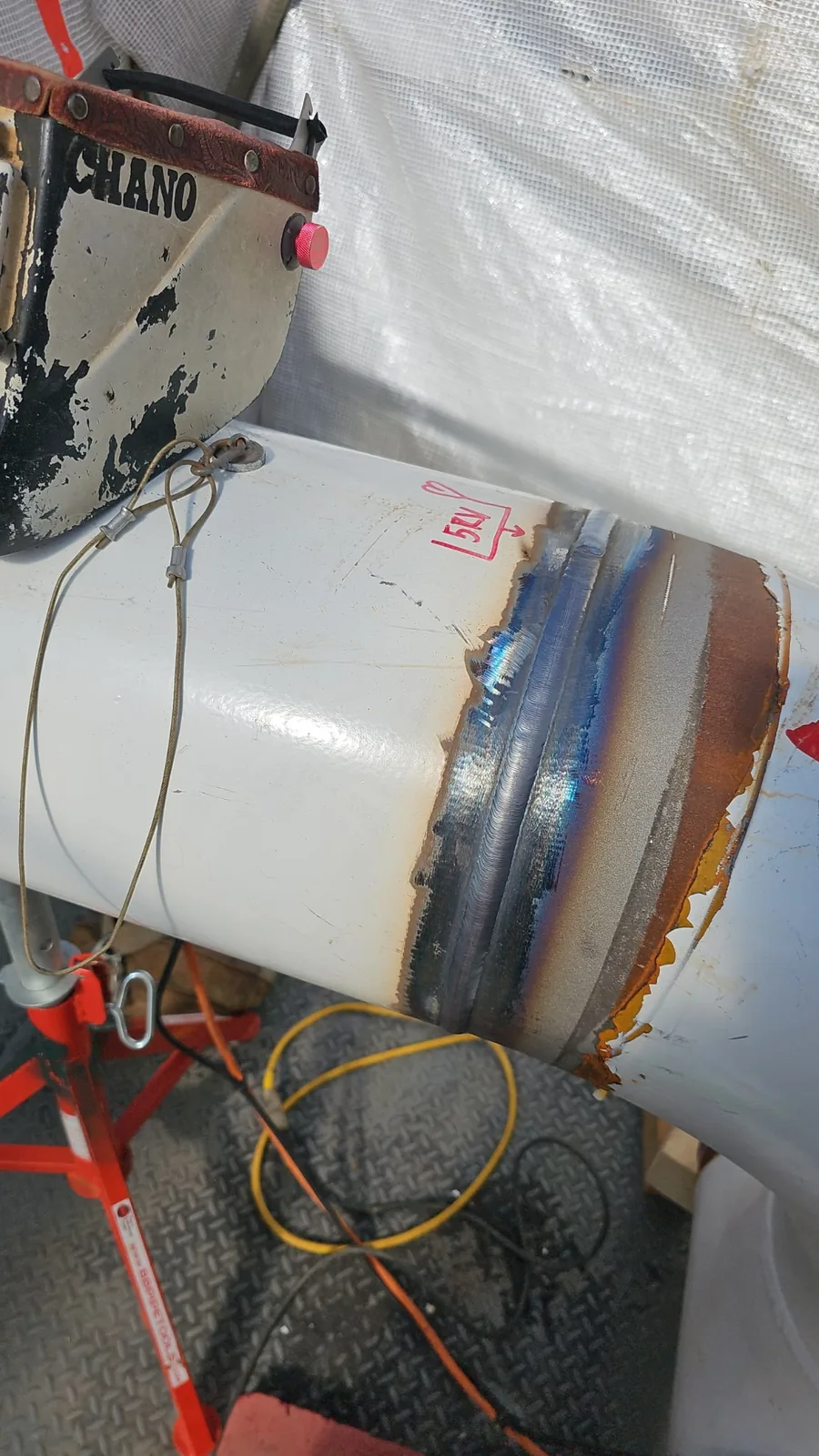 Close-up photo of a completed pipe weld