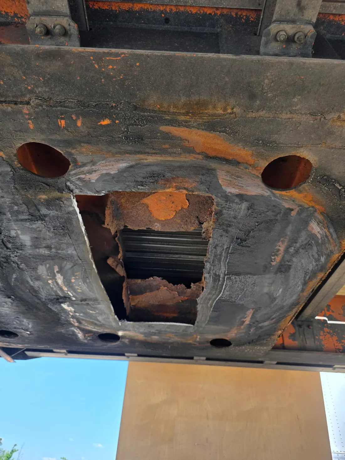 Damaged section cut out and opened up for repair